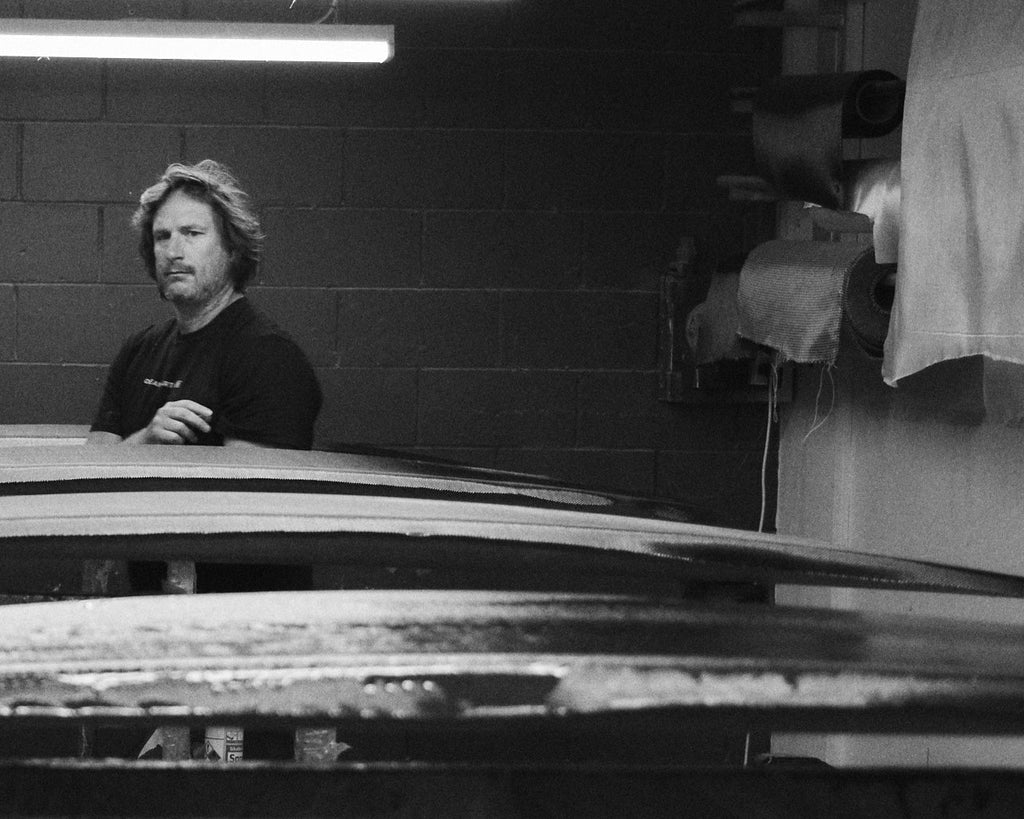 Amos supervising production at the Lucid Glassing factory